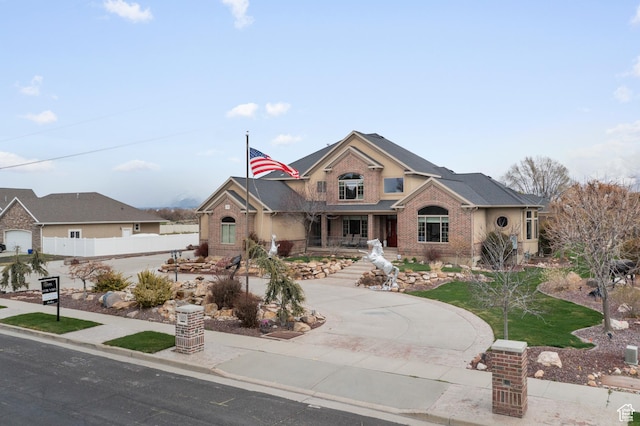 13053 S 1300 W, Riverton, UT 84065 - view of front facade with covered porch and brick siding