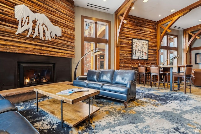 3720 N Sundial Ct Unit B417, Park City, UT 84098 - carpeted living room with visible vents, recessed lighting, log walls, and a glass covered fireplace