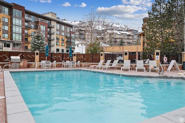 3720 N Sundial Ct Unit B417, Park City, UT 84098 - pool with a patio, a grill, fence, and area for grilling