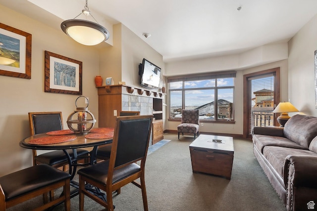 3720 N Sundial Ct Unit B417, Park City, UT 84098 - living room with carpet floors, a tile fireplace, and baseboards