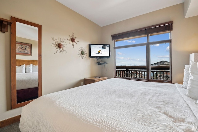 3720 N Sundial Ct Unit B417, Park City, UT 84098 - bedroom with vaulted ceiling and access to outside