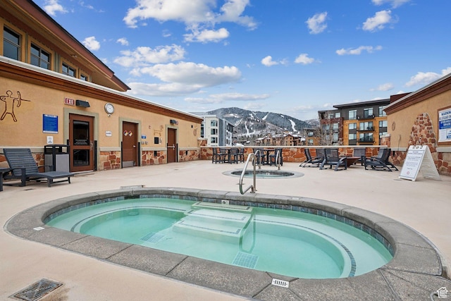 3720 N Sundial Ct Unit B417, Park City, UT 84098 - view of swimming pool with a community hot tub, a patio, and a mountain view