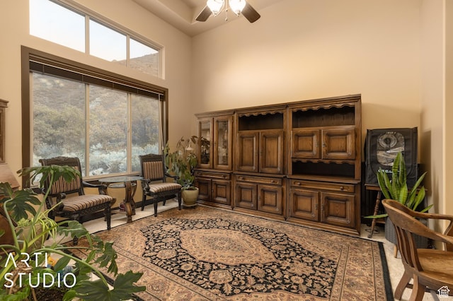 5055 Waterfall Dr, Pleasant View, UT 84414 - living area featuring a towering ceiling and ceiling fan