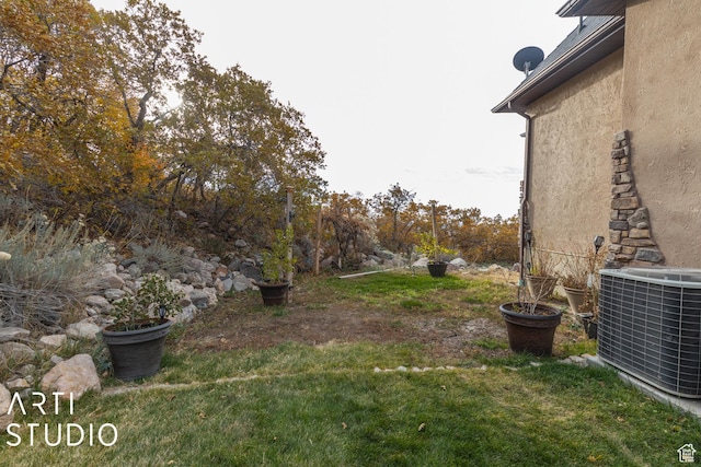 5055 Waterfall Dr, Pleasant View, UT 84414 - view of yard featuring cooling unit