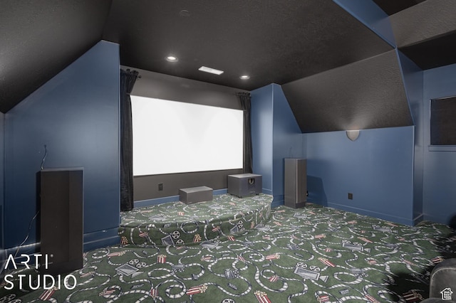 5055 Waterfall Dr, Pleasant View, UT 84414 - carpeted cinema room featuring recessed lighting, baseboards, vaulted ceiling, and a textured ceiling