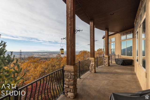 5055 Waterfall Dr, Pleasant View, UT 84414 - view of patio with a balcony