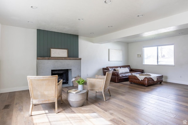 1468 S 100 W, Orem, UT 84058 - living room with visible vents, baseboards, a fireplace, and light wood-type flooring