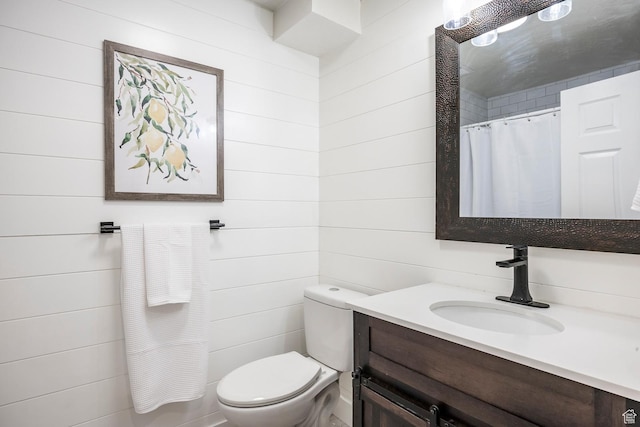 1468 S 100 W, Orem, UT 84058 - full bathroom with a shower with shower curtain, wooden walls, toilet, and vanity