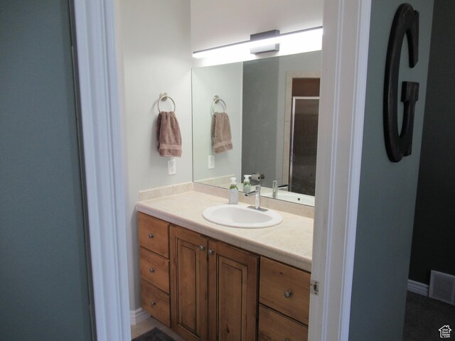 760 S Wellington Dr W, Kaysville, UT 84037 - bathroom with an enclosed shower, visible vents, and vanity