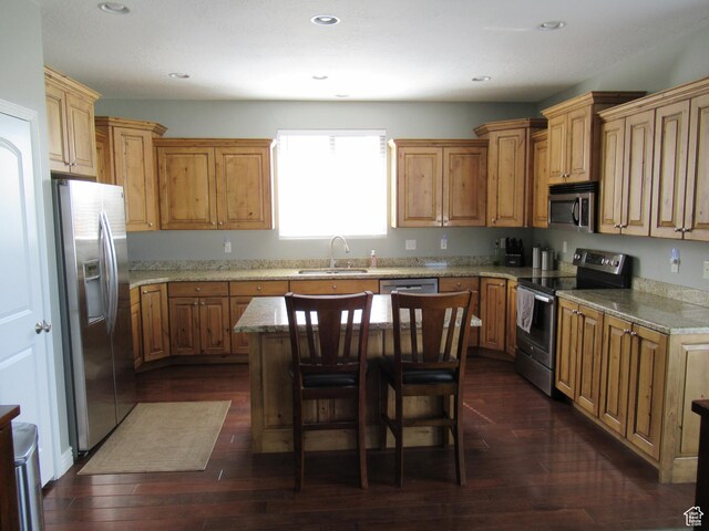 760 S Wellington Dr W, Kaysville, UT 84037 - kitchen featuring dark wood-type flooring, light stone countertops, a sink, and stainless steel appliances