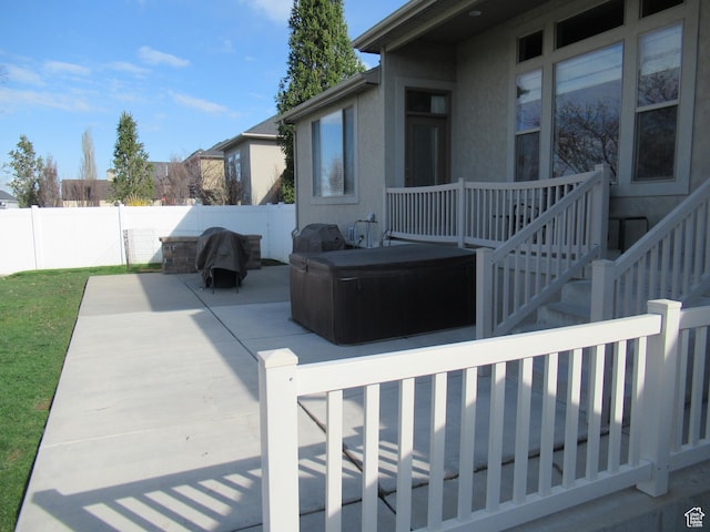 760 S Wellington Dr W, Kaysville, UT 84037 - view of patio with a fenced backyard and a hot tub