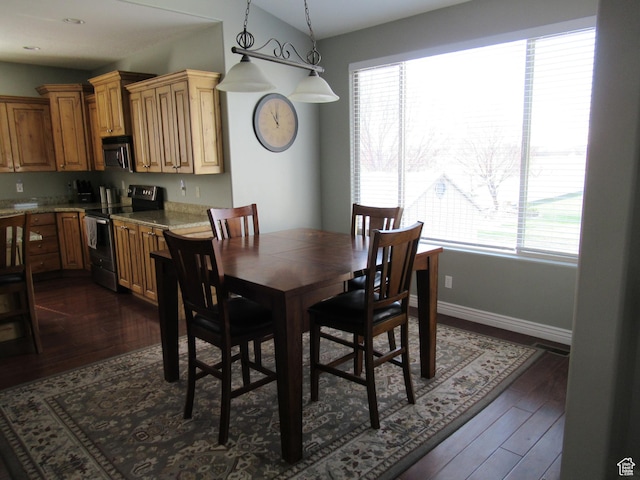 760 S Wellington Dr W, Kaysville, UT 84037 - dining room featuring visible vents, baseboards, lofted ceiling, and dark wood finished floors