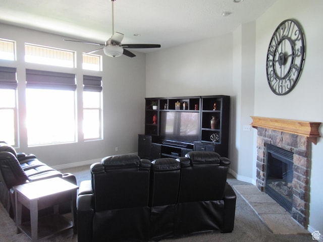 760 S Wellington Dr W, Kaysville, UT 84037 - carpeted living room with baseboards, a fireplace, and ceiling fan