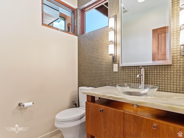 6639 E Chaparral Rd, Huntsville, UT 84317 - bathroom with backsplash, toilet, and vanity