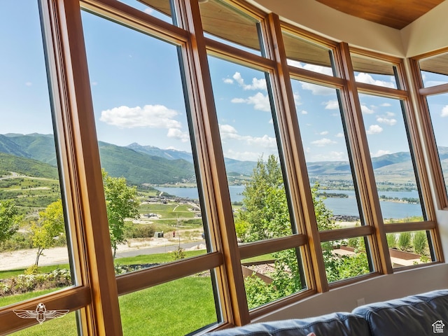 6639 E Chaparral Rd, Huntsville, UT 84317 - unfurnished sunroom featuring a water and mountain view and plenty of natural light
