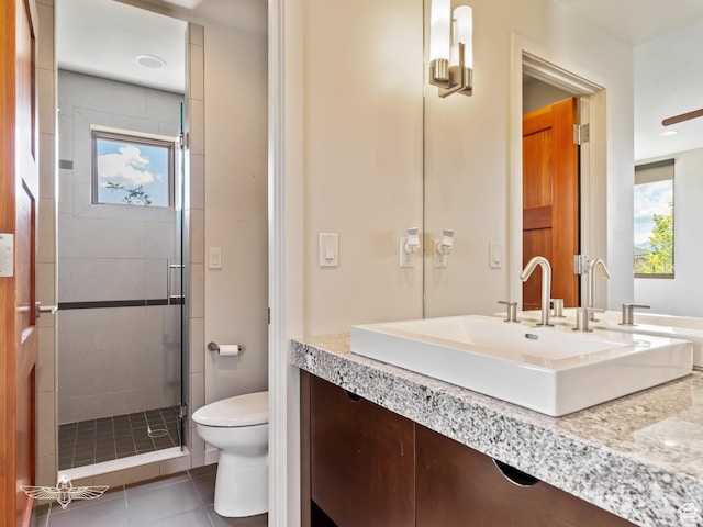 6639 E Chaparral Rd, Huntsville, UT 84317 - bathroom featuring plenty of natural light, tile patterned floors, toilet, and a shower stall