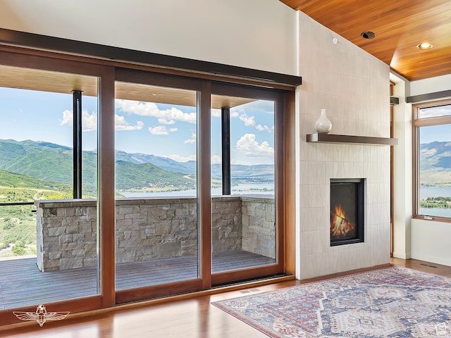 6639 E Chaparral Rd, Huntsville, UT 84317 - entryway featuring wooden ceiling, a healthy amount of sunlight, lofted ceiling, and wood finished floors