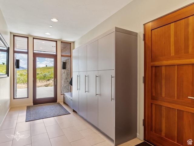 6639 E Chaparral Rd, Huntsville, UT 84317 - entryway featuring baseboards, recessed lighting, and light tile patterned floors