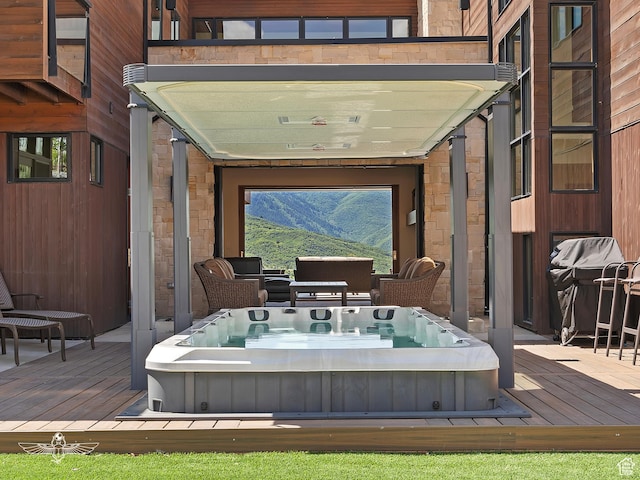 6639 E Chaparral Rd, Huntsville, UT 84317 - wooden deck with grilling area and an outdoor hot tub