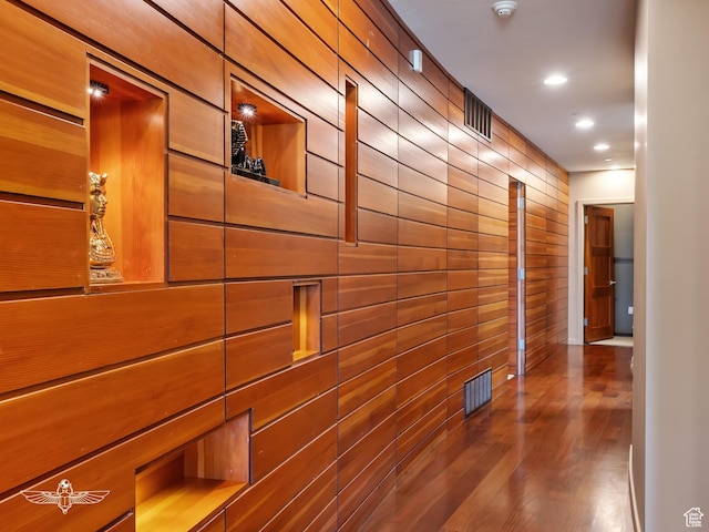 6639 E Chaparral Rd, Huntsville, UT 84317 - hall with visible vents, dark wood-type flooring, wooden walls, and recessed lighting