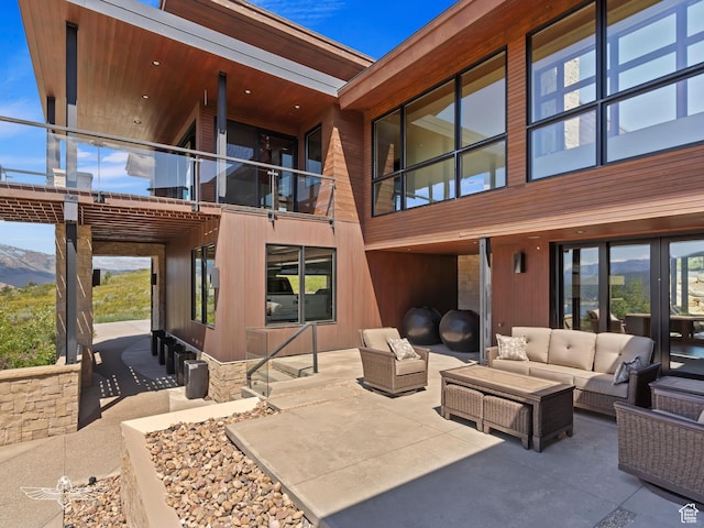6639 E Chaparral Rd, Huntsville, UT 84317 - view of patio featuring a balcony and an outdoor hangout area