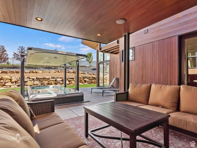 6639 E Chaparral Rd, Huntsville, UT 84317 - view of patio / terrace with outdoor lounge area, hot tub deck surround, and fence