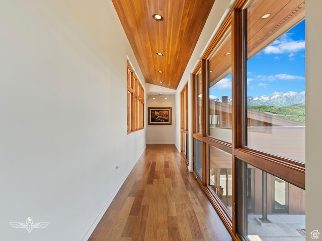 6639 E Chaparral Rd, Huntsville, UT 84317 - hall with baseboards, wood finished floors, recessed lighting, a mountain view, and wood ceiling