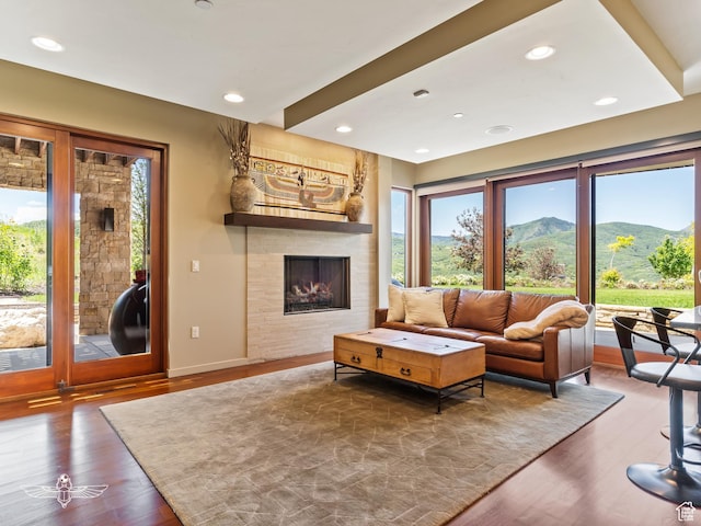 6639 E Chaparral Rd, Huntsville, UT 84317 - living room with a fireplace, a mountain view, wood finished floors, and recessed lighting