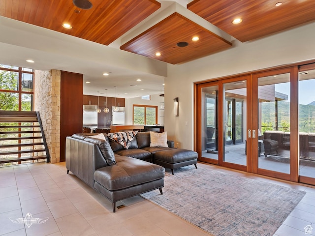 6639 E Chaparral Rd, Huntsville, UT 84317 - living room featuring french doors, wood ceiling, a healthy amount of sunlight, and stairs