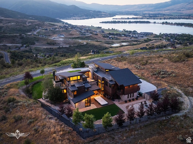 bird's eye view featuring a water and mountain view