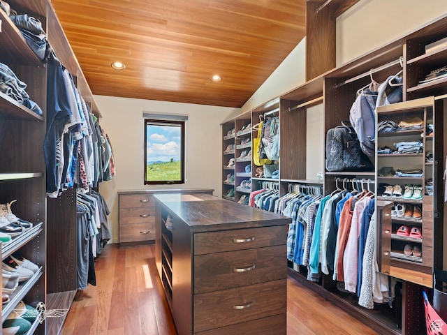 6639 E Chaparral Rd, Huntsville, UT 84317 - spacious closet with lofted ceiling and wood finished floors
