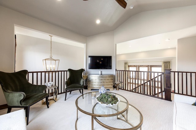 living area featuring lofted ceiling, an upstairs landing, and light colored carpet