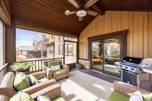 sunroom / solarium featuring an outdoor hangout area, a ceiling fan, and beam ceiling
