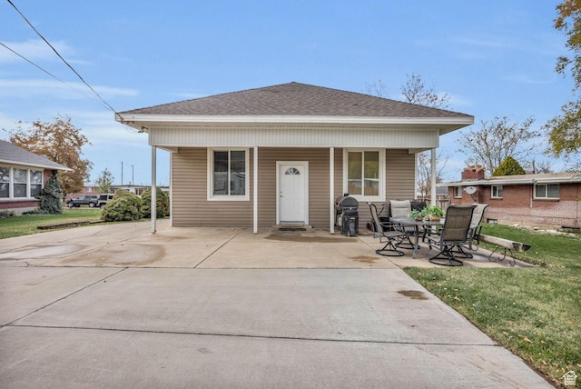 410 N 175 E, North Salt Lake, UT 84054 - bungalow with a porch, a shingled roof, and a front lawn