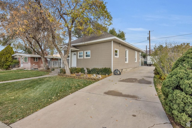 410 N 175 E, North Salt Lake, UT 84054 - view of front of house with a front yard and concrete driveway
