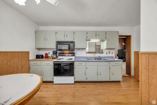 410 N 175 E, North Salt Lake, UT 84054 - kitchen featuring black microwave, light wood finished floors, white electric range oven, and a sink