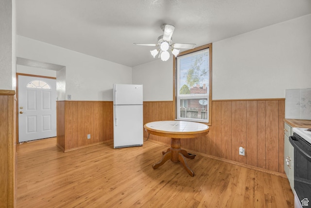 410 N 175 E, North Salt Lake, UT 84054 - dining space with a wainscoted wall, light wood finished floors, ceiling fan, and wood walls