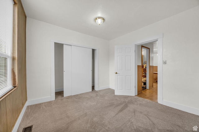 410 N 175 E, North Salt Lake, UT 84054 - unfurnished bedroom with a closet, baseboards, visible vents, and carpet