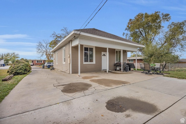 410 N 175 E, North Salt Lake, UT 84054 - bungalow-style home featuring concrete driveway, a shingled roof, and fence