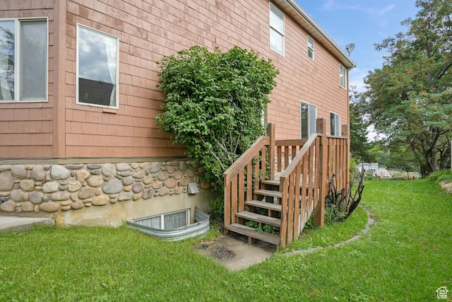 view of property exterior with a yard