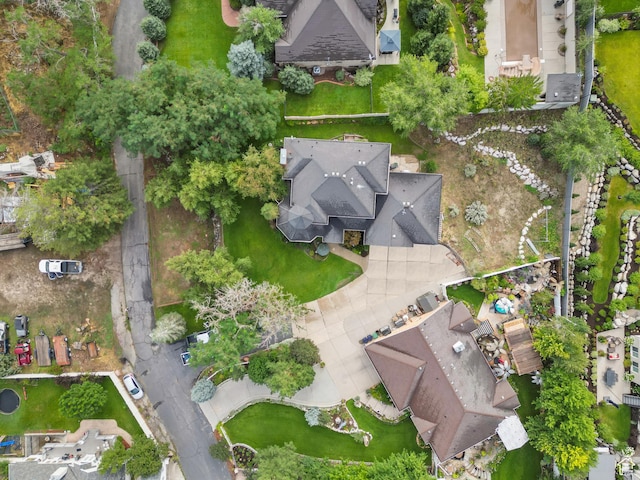 birds eye view of property with a residential view