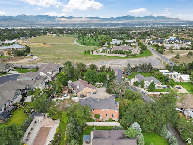 drone / aerial view with a mountain view and a residential view