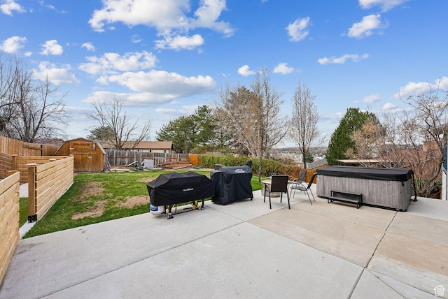 1567 Heather Dr, Layton, UT 84040 - view of patio / terrace featuring a fenced backyard, area for grilling, and a hot tub
