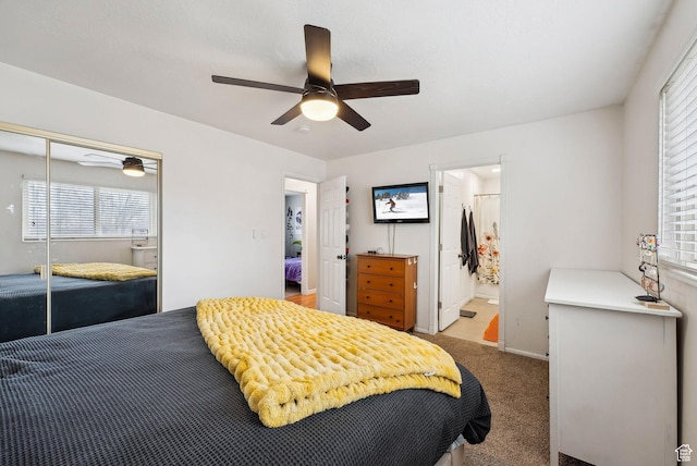 1567 Heather Dr, Layton, UT 84040 - carpeted bedroom with connected bathroom, a closet, and ceiling fan