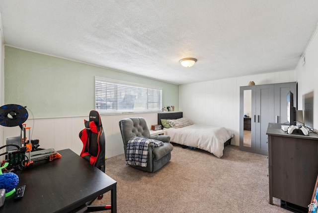 1567 Heather Dr, Layton, UT 84040 - carpeted bedroom featuring visible vents and a textured ceiling
