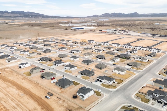 aerial view featuring a residential view and a mountain view