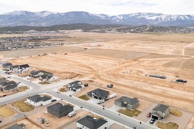 drone / aerial view featuring a mountain view and a residential view