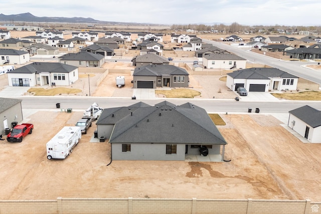 birds eye view of property featuring a residential view and a mountain view