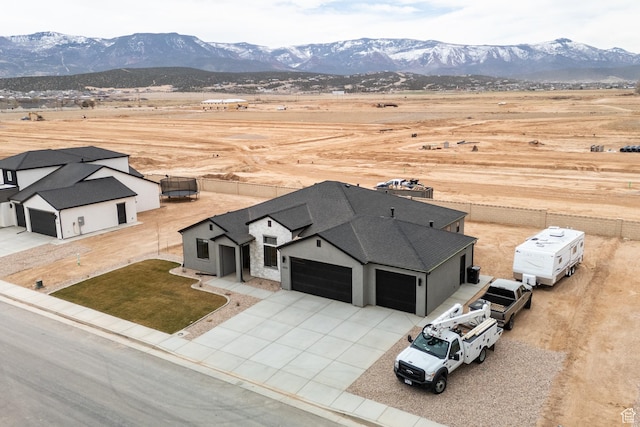 bird's eye view with a mountain view