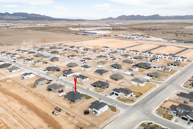 bird's eye view featuring a mountain view and a residential view